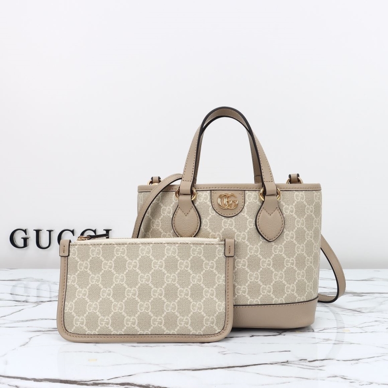 G*u*i shopping bags